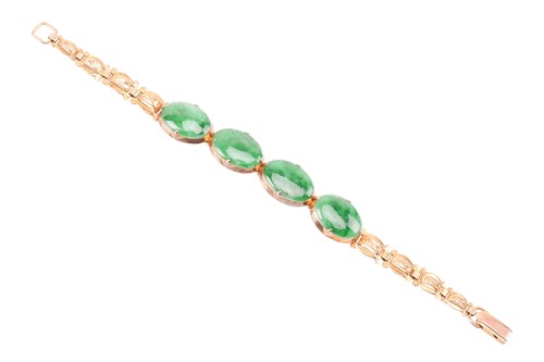 Lot 29 - A jade link bracelet, comprising four oval...