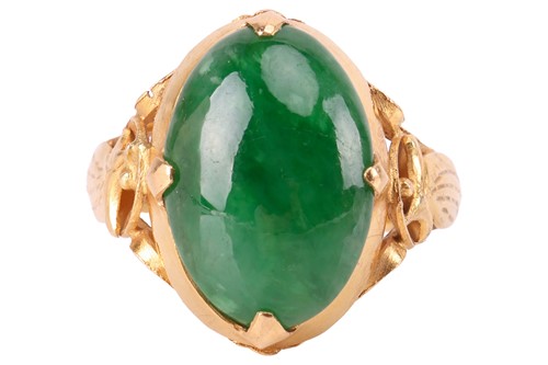 Lot 136 - A jade dress ring, featuring a deep green...