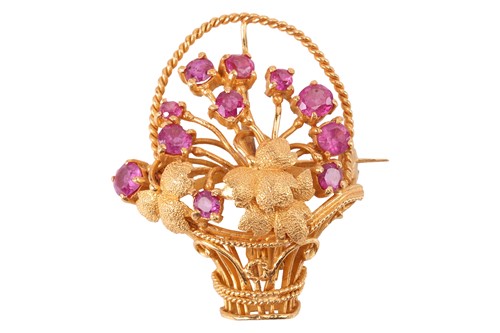 Lot 175 - A ruby-set giardinetti brooch, with textured...