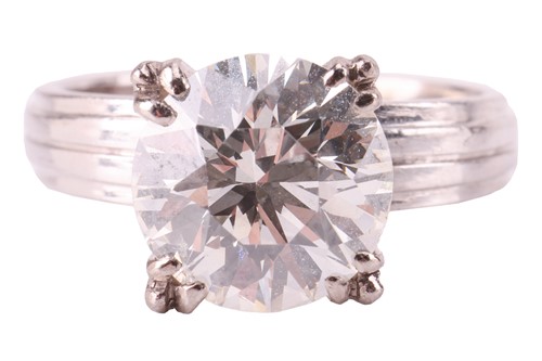 Lot 59 - A diamond solitaire ring, featuring a round...