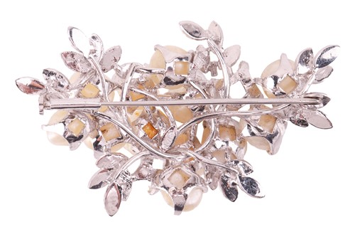 Lot 40 - A pearl-set spray brooch, claw-set with twelve...