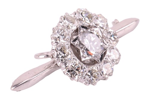 Lot 42 - A diamond-set floral cluster brooch, in white...