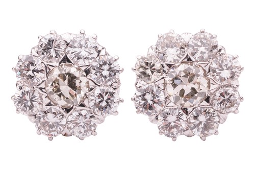 Lot 45 - A pair of diamond-set floral cluster earrings,...