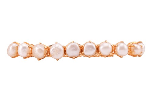 Lot 47 - A pearl-set line bracelet, comprising a row of...