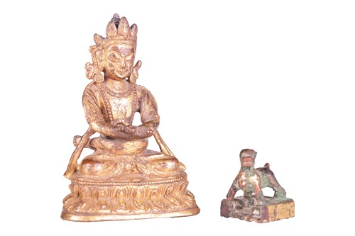 Lot 127 - A Sino-Tibetan gilt bronze tantric Buddha...