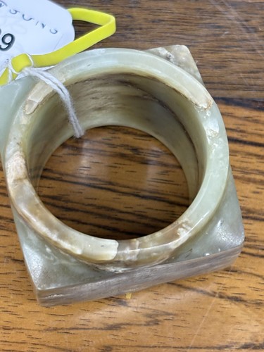 Lot 139 - A Chinese Neolithic style carved jade cong,...