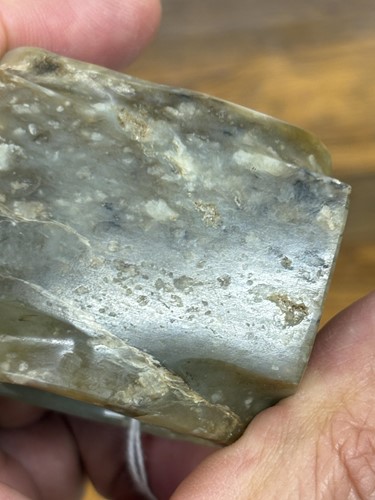 Lot 139 - A Chinese Neolithic style carved jade cong,...