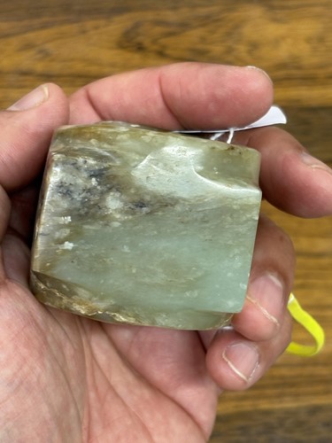 Lot 139 - A Chinese Neolithic style carved jade cong,...