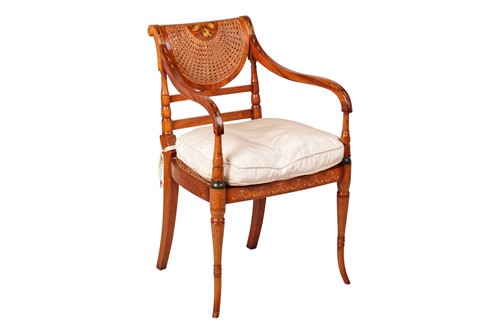 Lot 216 - A Regency-style painted satinwood open-arm...