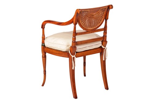 Lot 216 - A Regency-style painted satinwood open-arm...