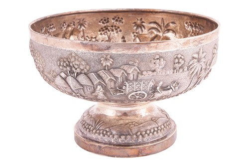 Lot 327 - An Indian white metal pedestal bowl, profusely...