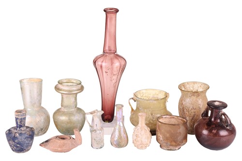 Lot 346 - A collection of Roman glass vessels, the...