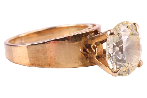 Lot 56 - A diamond solitaire ring, claw-set with a...