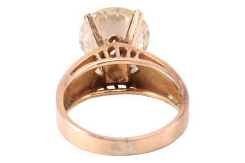 Lot 56 - A diamond solitaire ring, claw-set with a...