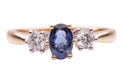 Lot 39 - A sapphire and diamond trilogy ring in 18ct...