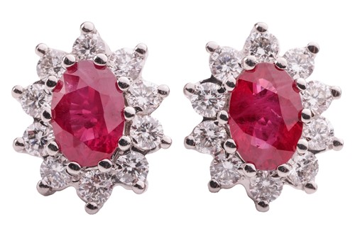 Lot 13 - A pair of ruby and diamond cluster earrings,...