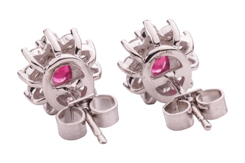 Lot 13 - A pair of ruby and diamond cluster earrings,...