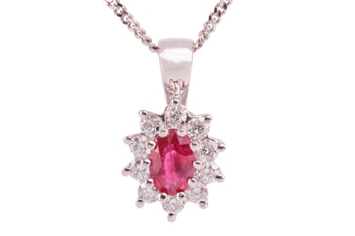 Lot 25 - A ruby and diamond cluster pendant on chain,...