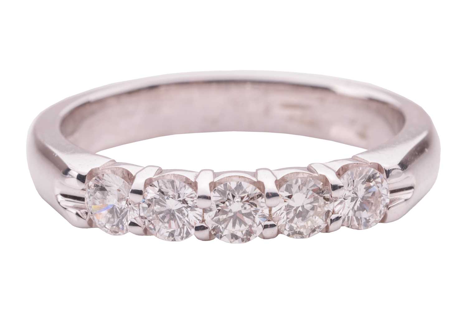 Lot 66 - A diamond five-stone ring in 18ct white gold,...