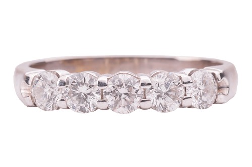 Lot 69 - A diamond five-stone ring in 18ct white gold,...