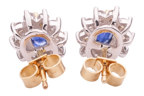 Lot 53 - A pair of sapphire and diamond cluster...