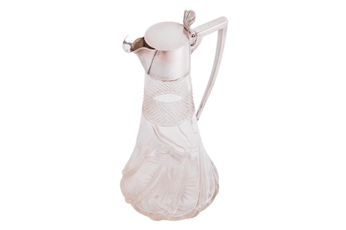 Lot An Edwardian silver-mounted claret ewer,...