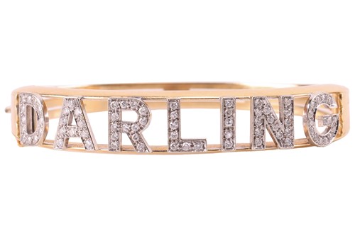 Lot 61 - A diamond-set 'Darling' hinged bangle,...