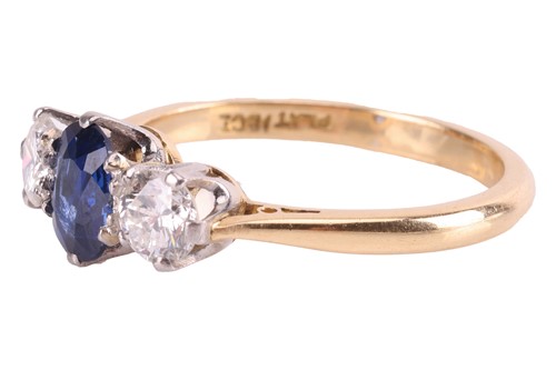 Lot 9 - A sapphire and diamond three-stone ring,...