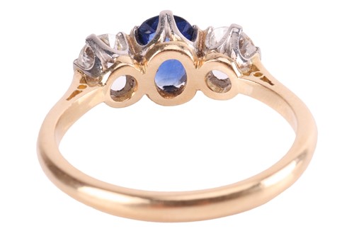 Lot 9 - A sapphire and diamond three-stone ring,...