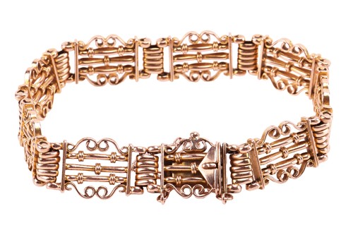 Lot 24 - An Edwardian fancy link bracelet, hinged...