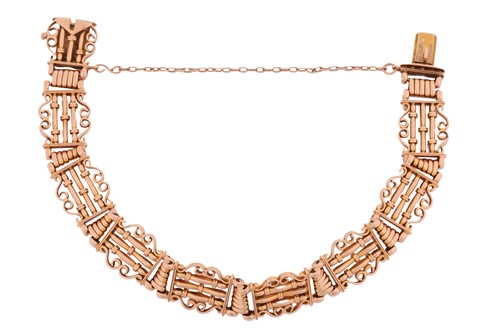 Lot 24 - An Edwardian fancy link bracelet, hinged...