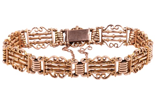 Lot 24 - An Edwardian fancy link bracelet, hinged...