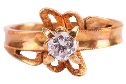 Lot 92 - A diamond solitaire ring, of stylised floral...