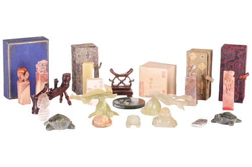 Lot 118 - A small collection of Chinese decorative jade...