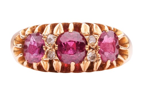 Lot 40 - A ruby three-stone ring, claw-set with three...