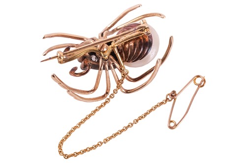 Lot 236 - A ruby, diamond and pearl spider brooch, the...