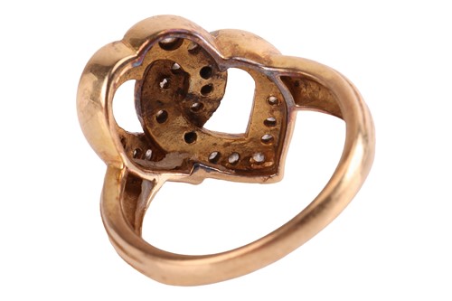 Lot 30 - A diamond-set heart ring, featuring two...