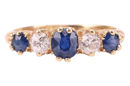 Lot 194 - An Edwardian sapphire and diamond half-hoop...