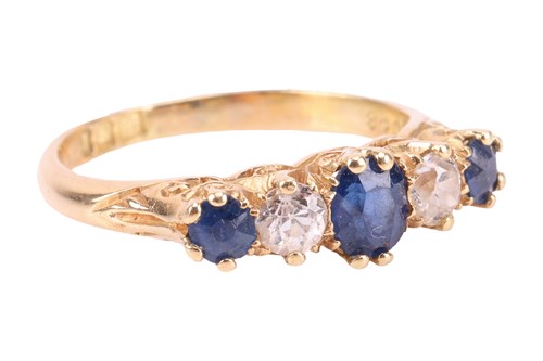 Lot 194 - An Edwardian sapphire and diamond half-hoop...