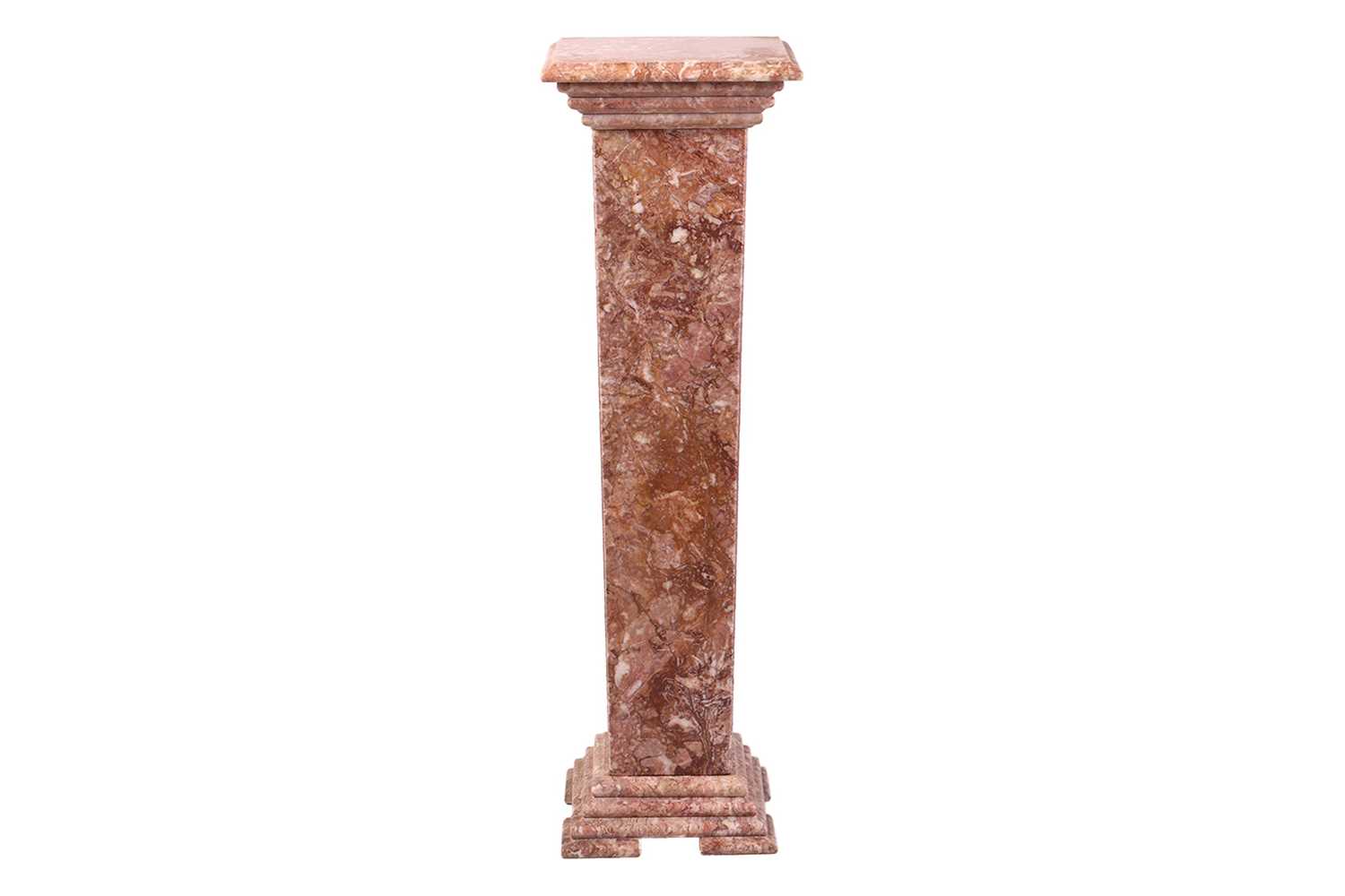 Lot 215 - A variegated rouge marble pedestal of square...