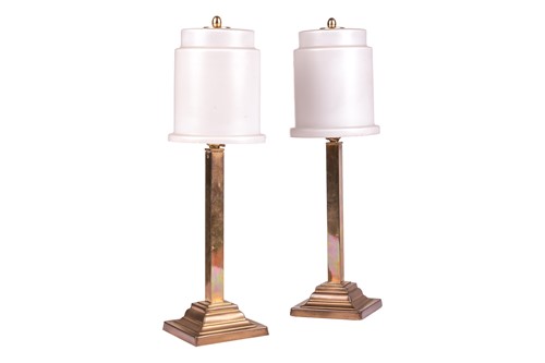 Lot 279 - A pair of 'Odeonesque' Art Deco brass pillar...