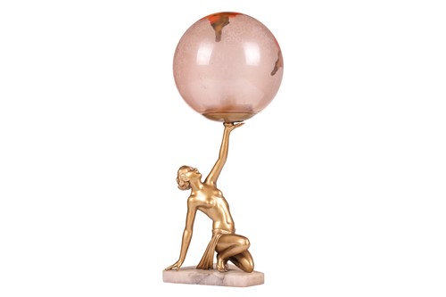 Lot 280 - An Art Deco cold-painted figural globe lamp,...