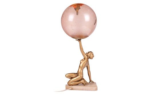 Lot 280 - An Art Deco cold-painted figural globe lamp,...