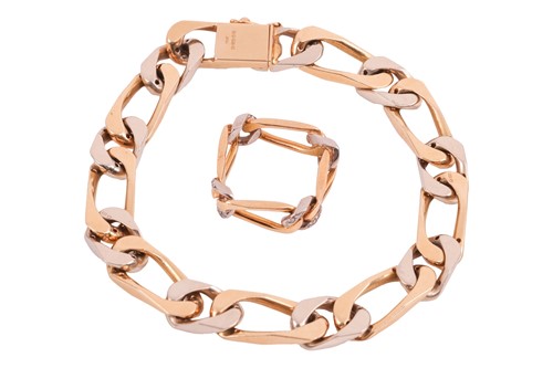 Lot 157 - A diamond-set figaro link bracelet and...
