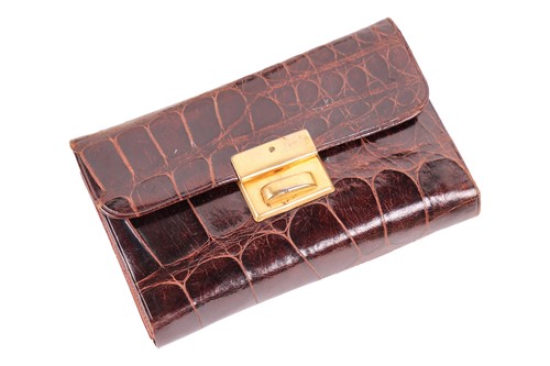 Lot 365 - A fitted crocodile case with silver gilt...