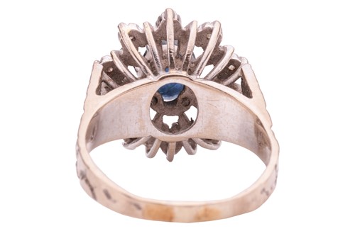Lot 154 - A sapphire and diamond-set cluster ring, the...