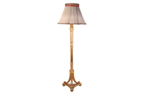 Lot 139 - A carved wood and gilt gesso standard lamp...