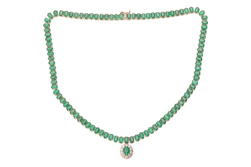 Lot 145 - An emerald and diamond necklace, composed of...