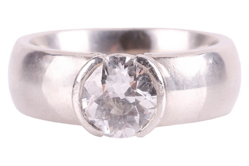 Lot 233 - A diamond solitaire ring in platinum,...