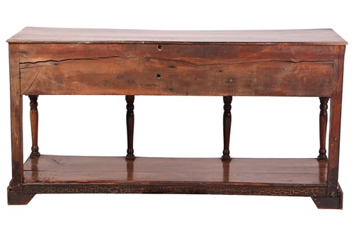 Lot 107 - A George III oak pot board dresser base with a...